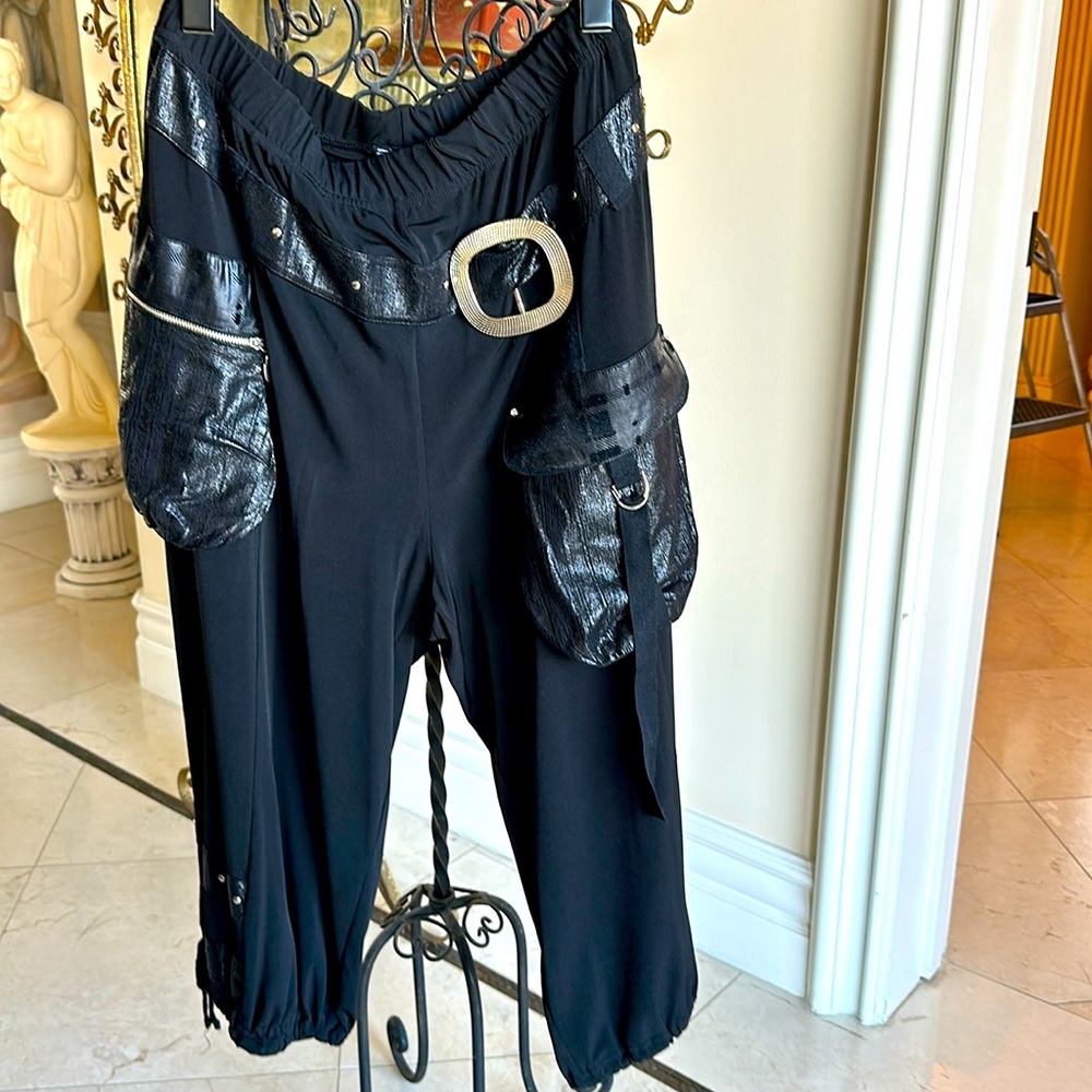 Matching jacket with hoodie and capri shorts.